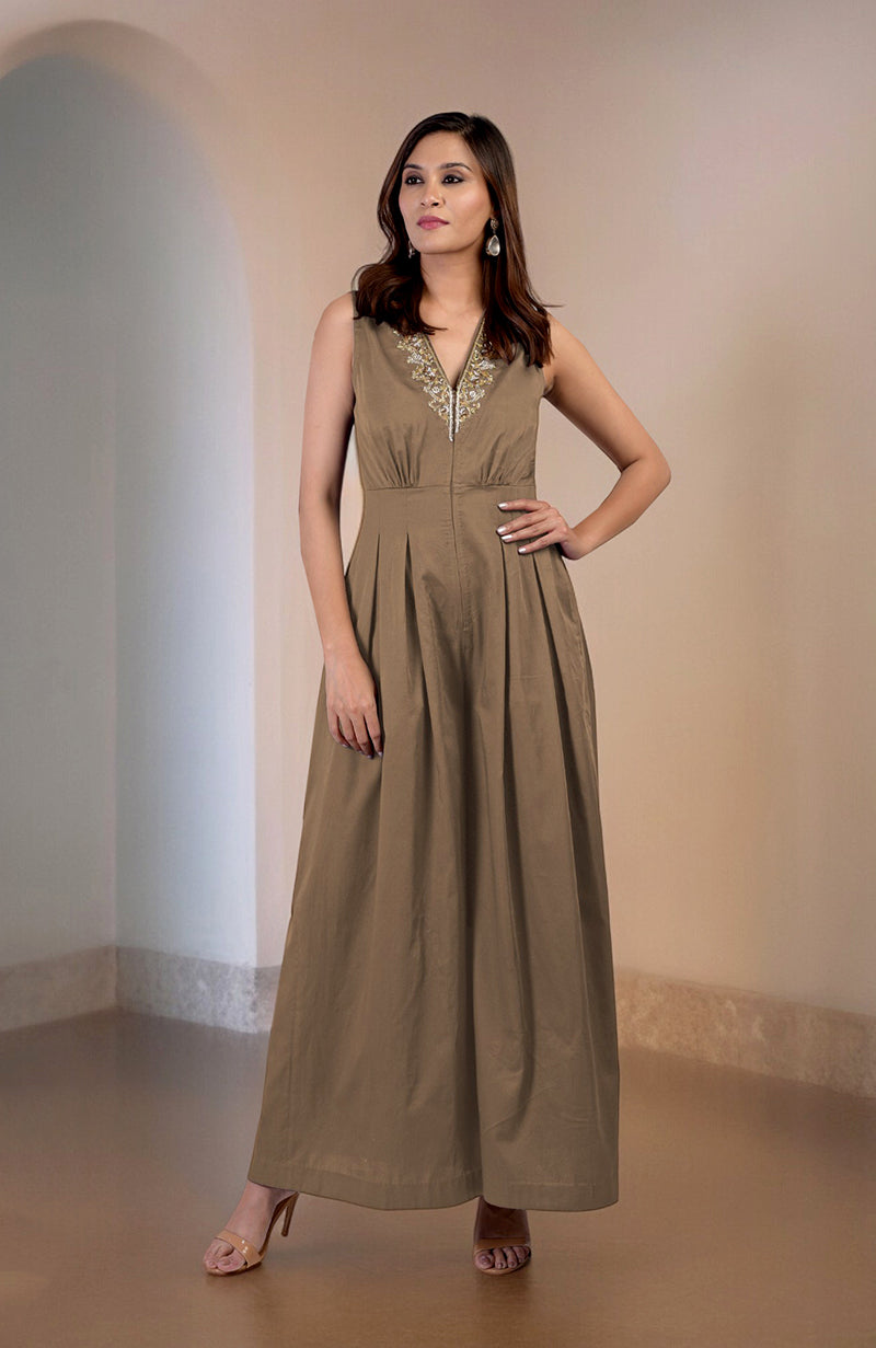 Brownie gold tilla hand-embroidered jumpsuit with a V-neck and front pleats.
