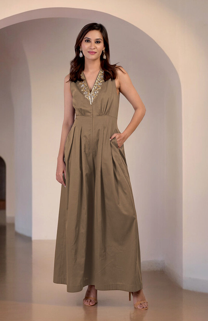 Brownie gold tilla hand-embroidered jumpsuit with a V-neck and front pleats.