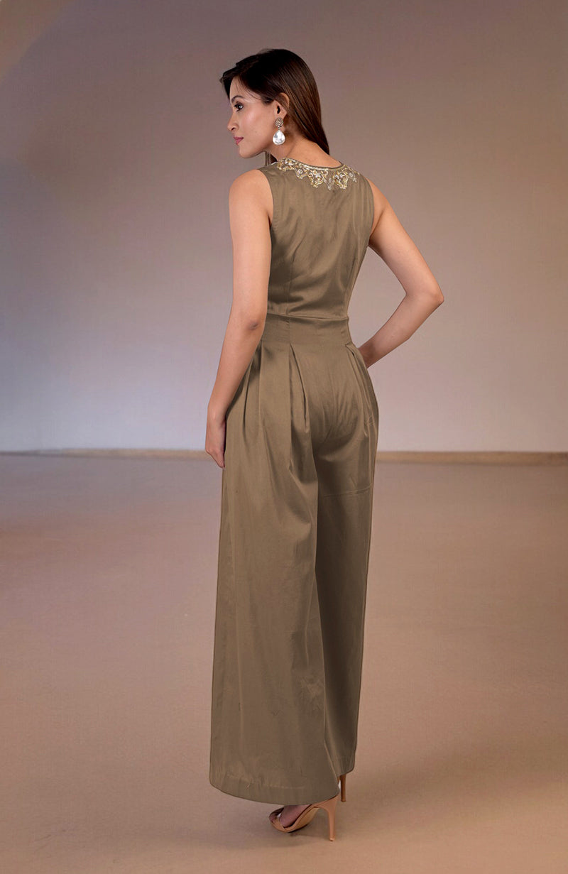 Brownie gold tilla hand embroidered jumpsuit with front pleats and pockets.