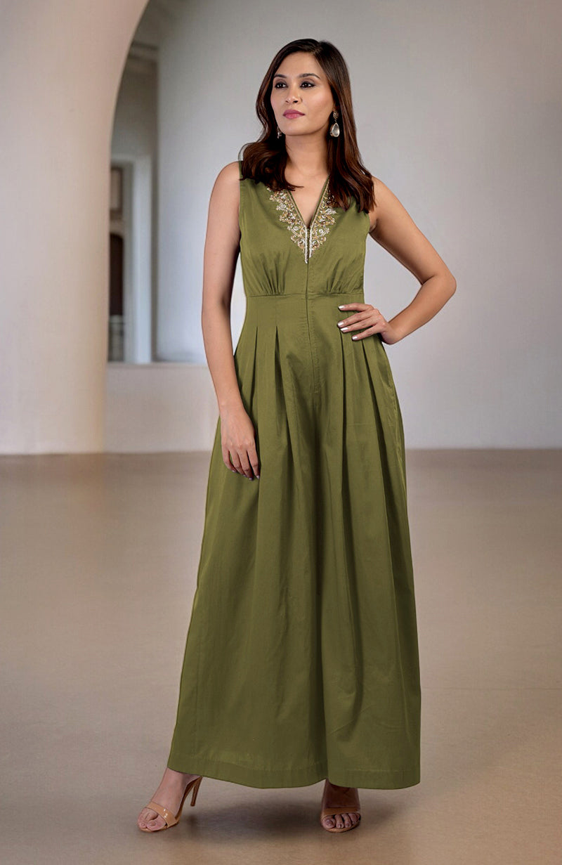 Green moss jumpsuit with gold tilla hand embroidery and a V-neckline.