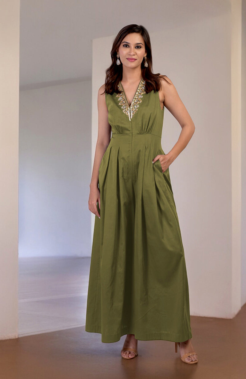 Green moss jumpsuit with gold tilla hand embroidery, V-neckline, and front zip.
