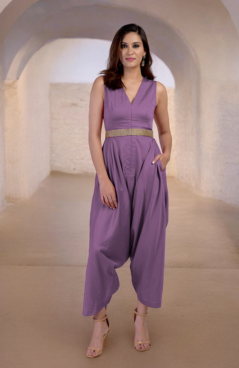 Lavender V-neck jumpsuit with a gold embroidered belt and afgani-style pants.