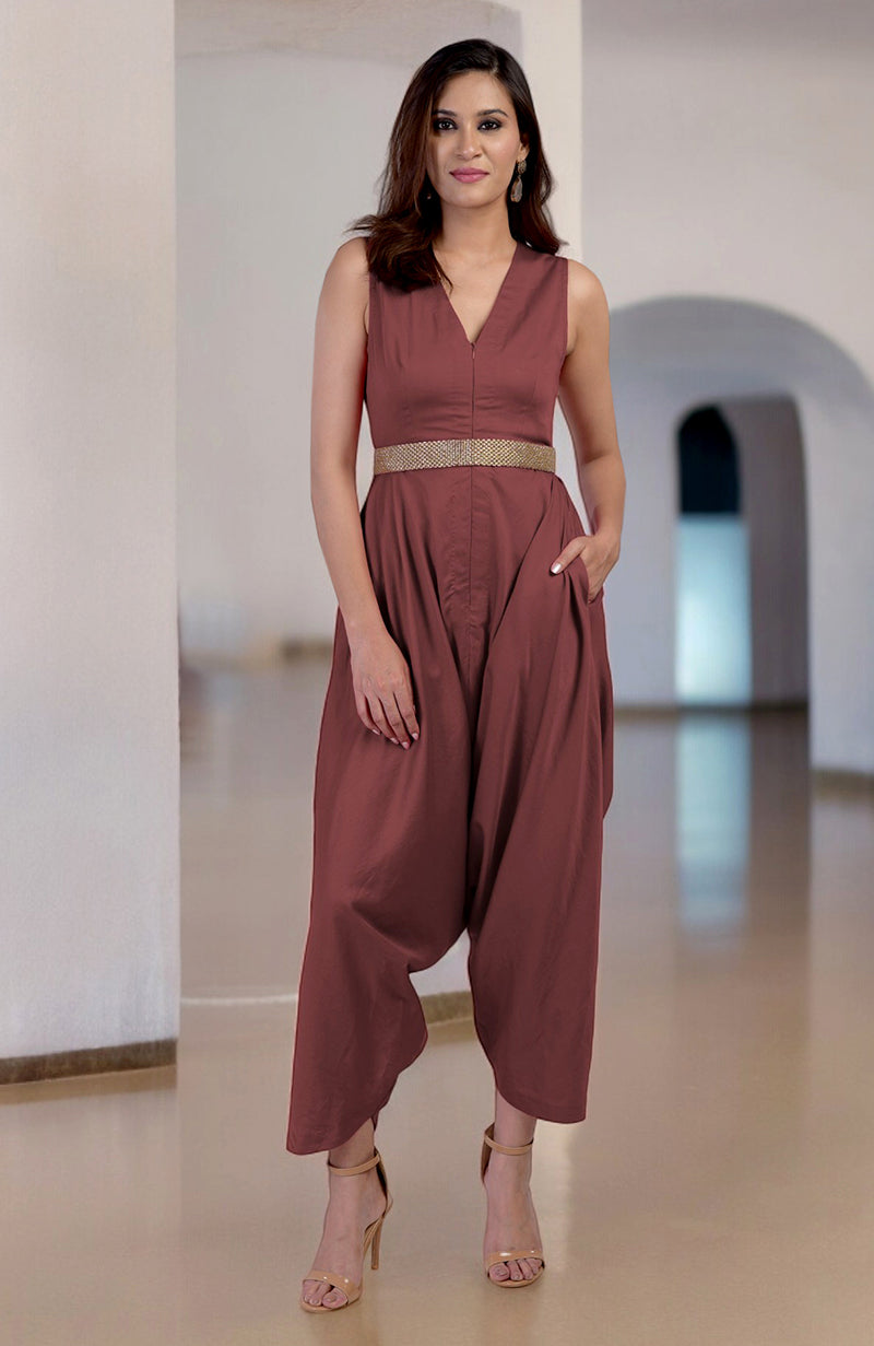 Marsala V-neck jumpsuit with a gold embroidered belt and afgani-style pants.