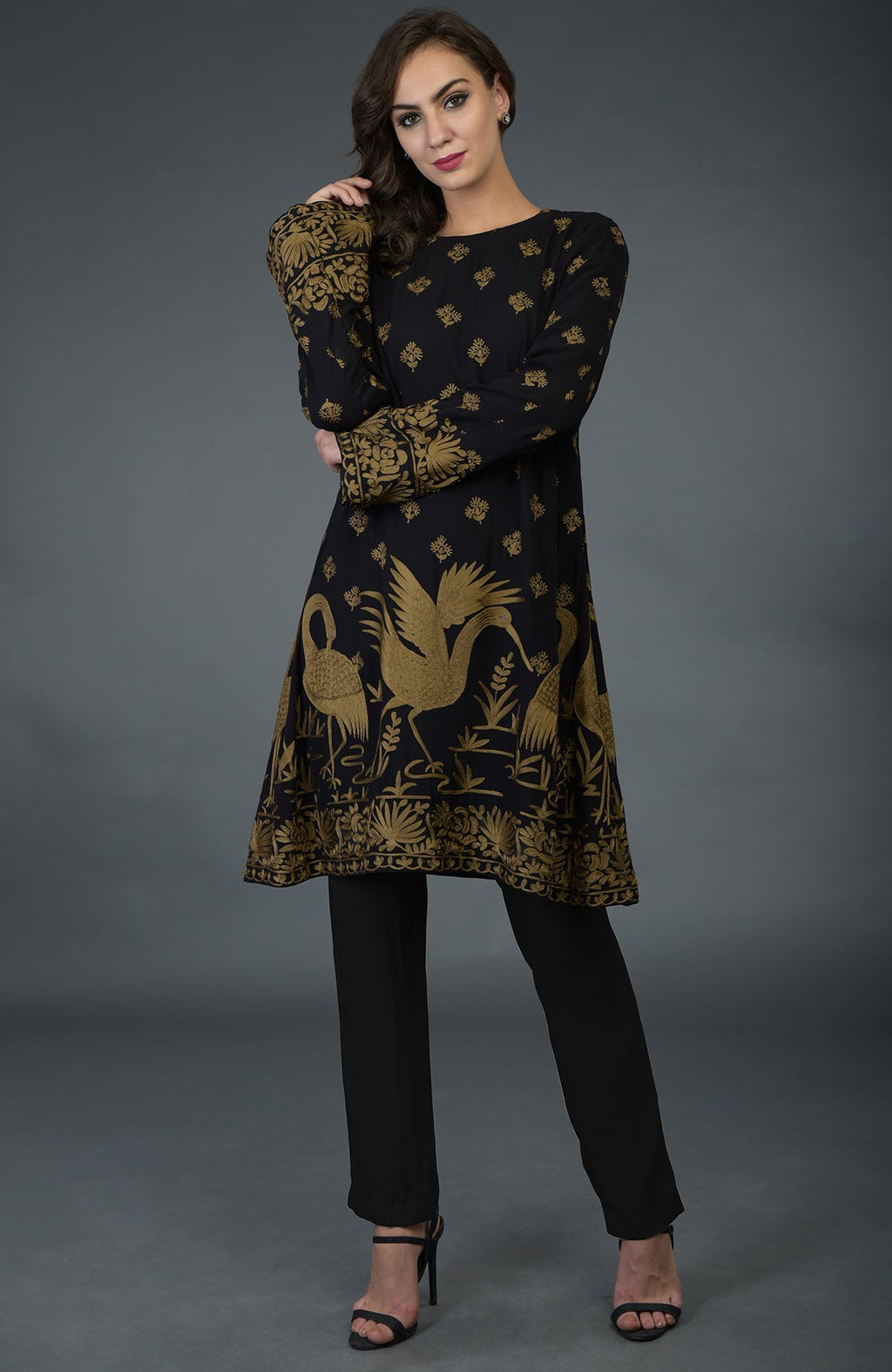 Black-beige gold Parsi embroidered tunic suit with crane motifs.