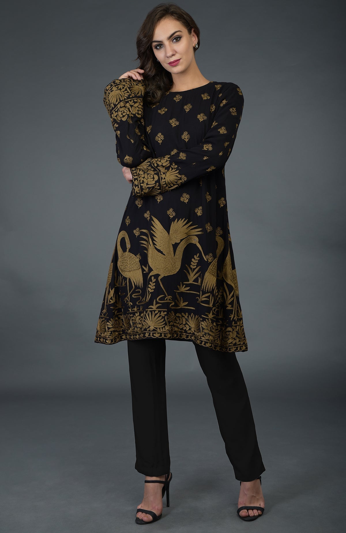 Black-beige gold Parsi embroidered tunic suit with crane motifs.