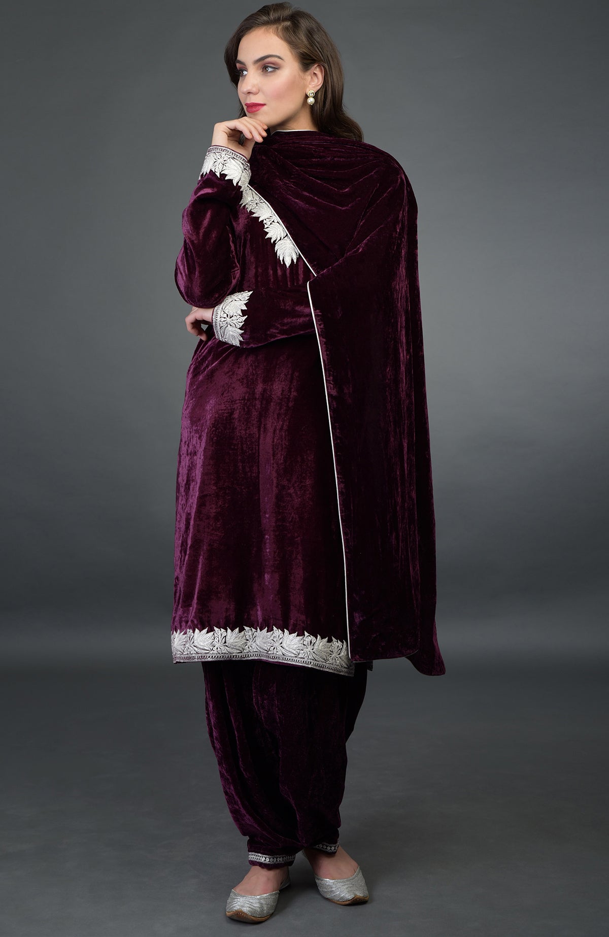 Dark plum silk-velvet Patiala salwar suit with silver Tilla floral embroidery.