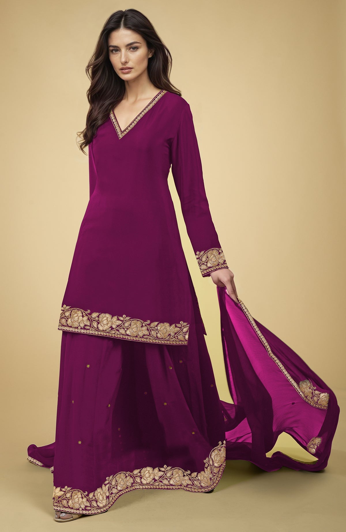 Black crepe sharara set with gold Kashmiri tilla embroidery on kurta, sharara, and dupatta edges