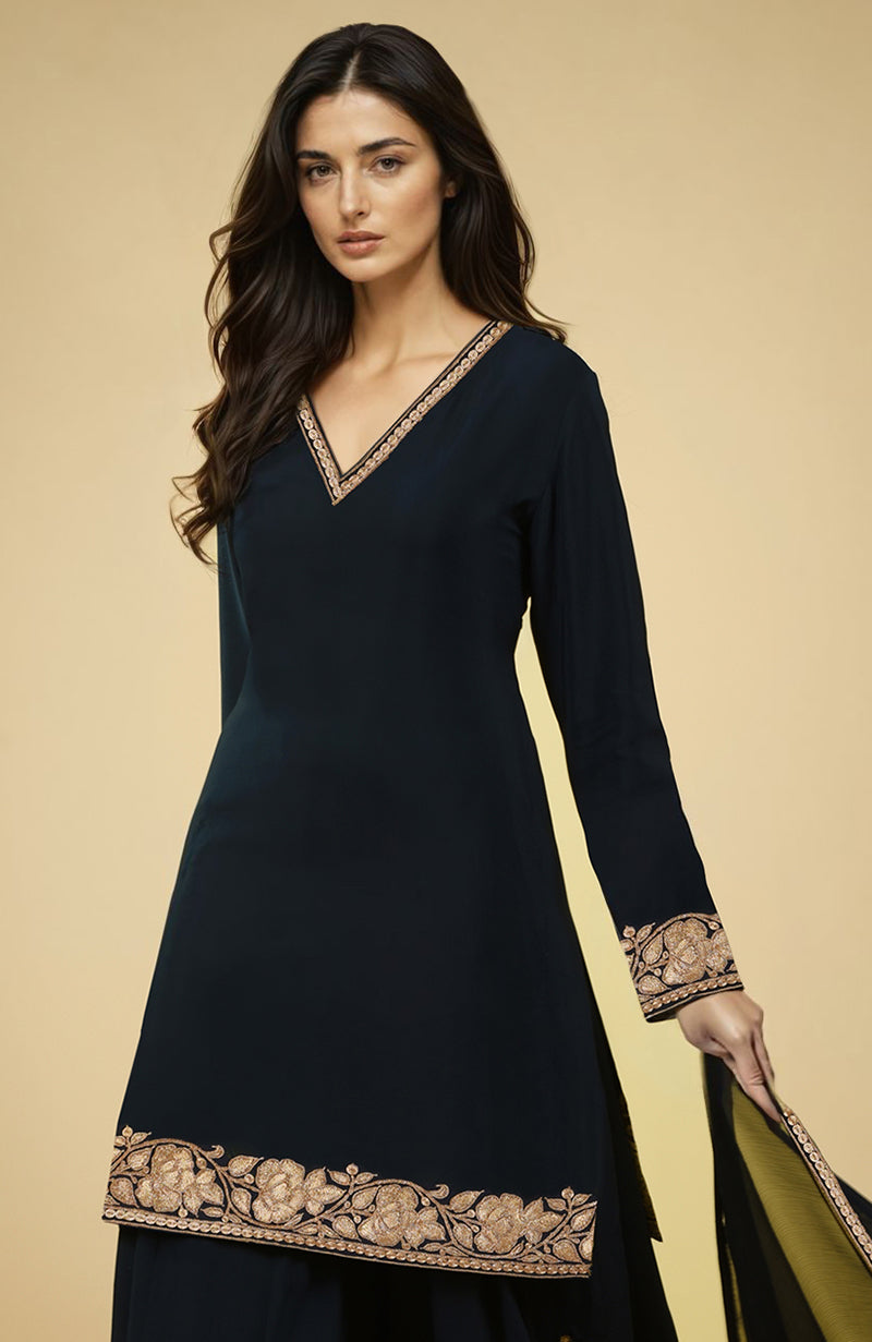 Black crepe sharara set with gold Kashmiri tilla embroidery on kurta, sharara, and dupatta edges