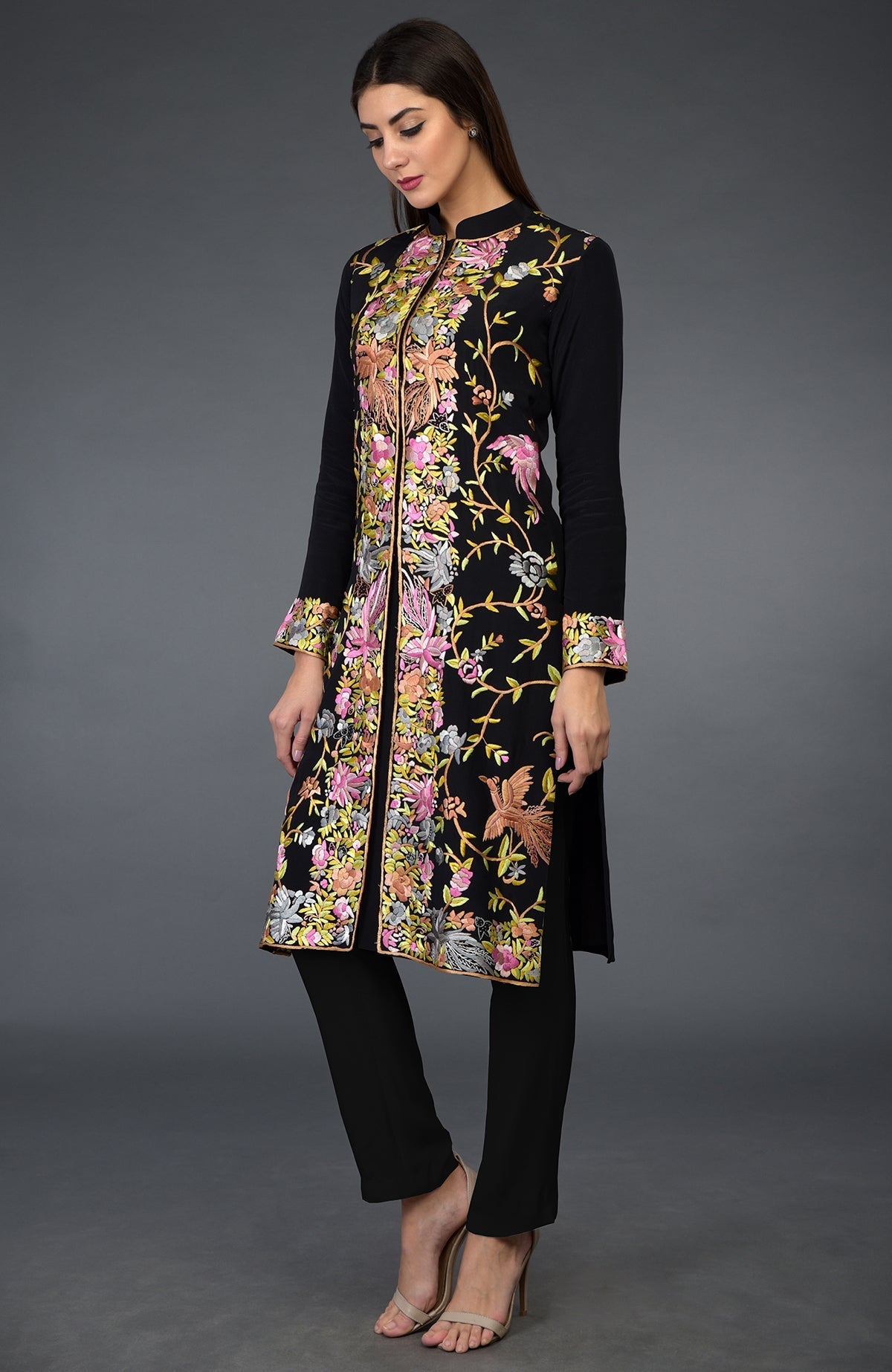 Black Parsi Gara embroidered jacket with colorful floral and bird patterns.