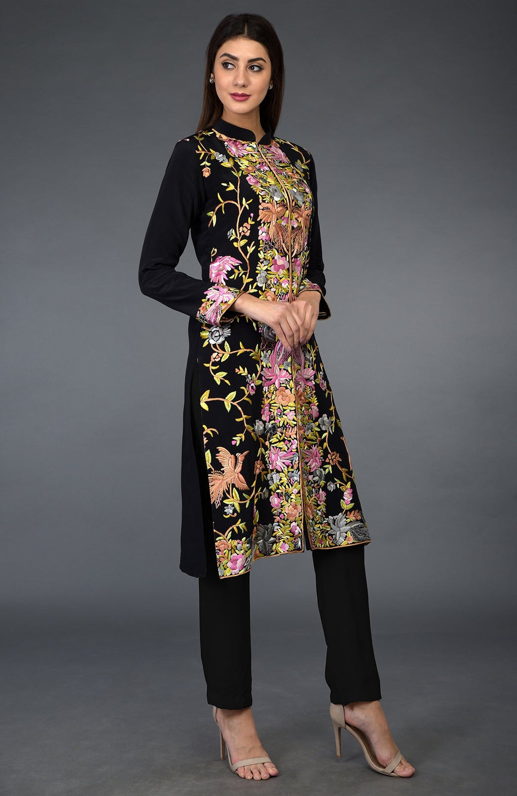 Black Parsi Gara embroidered jacket with colorful floral and bird patterns.