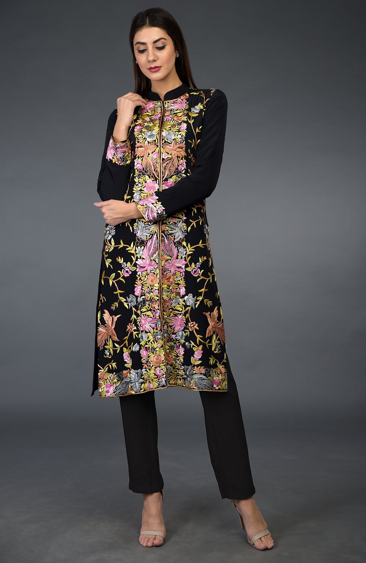 Black Parsi Gara embroidered jacket with colorful floral and bird patterns.