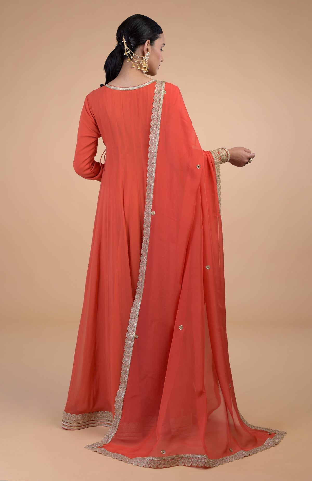 Burnt orange Angrakha Anarkali set with Gota Patti embroidery and matching dupatta.