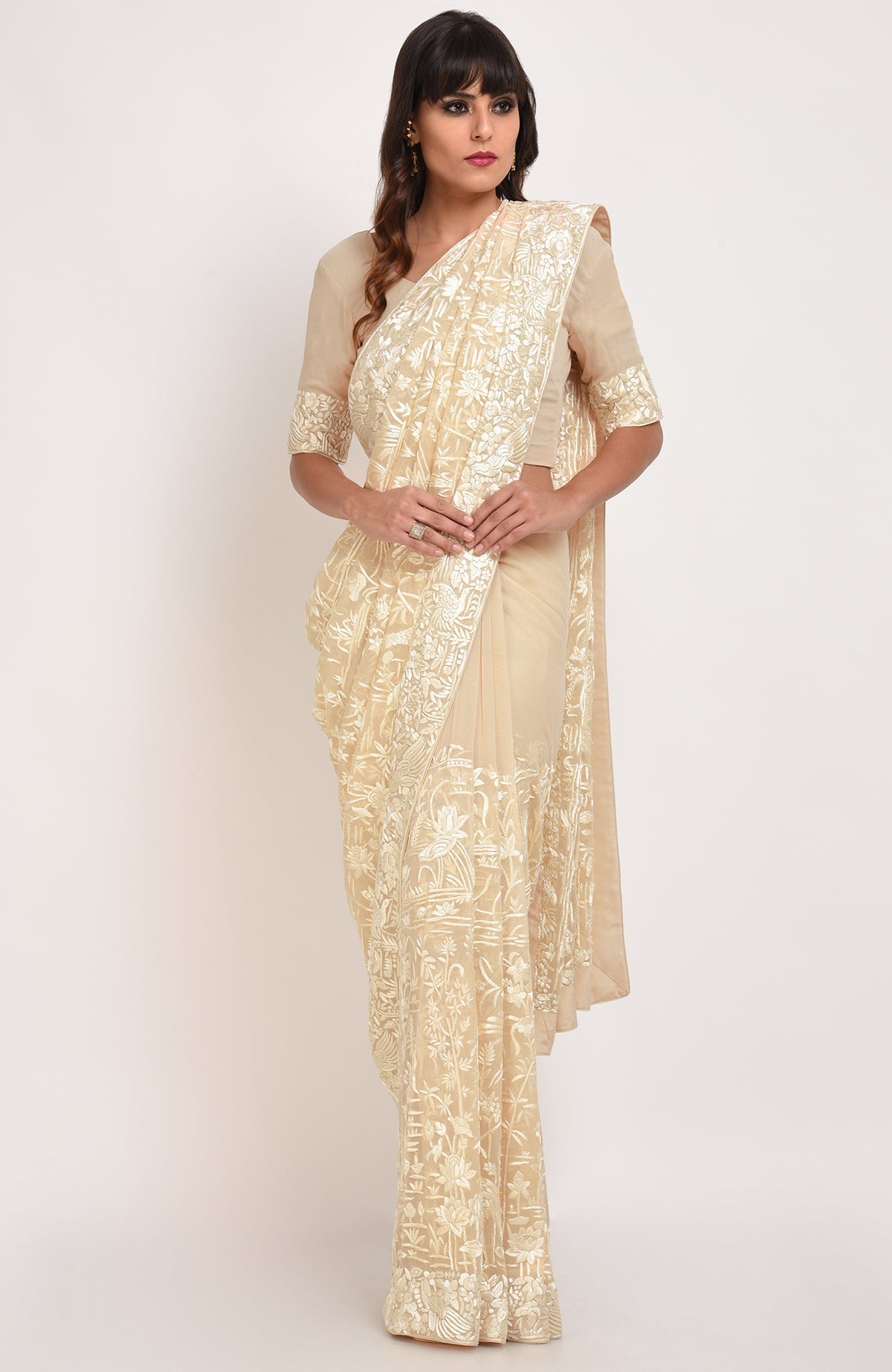 Fawn Parsi Gara hand embroidered saree with floral and bird motifs.