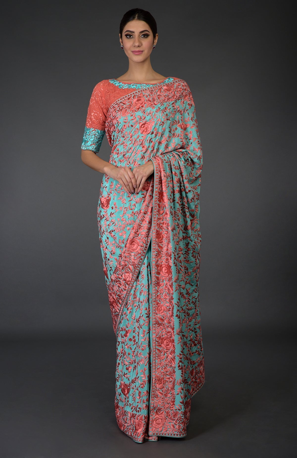 Aqua Parsi Gara hand embroidered saree with peach floral jaal and matching blouse.