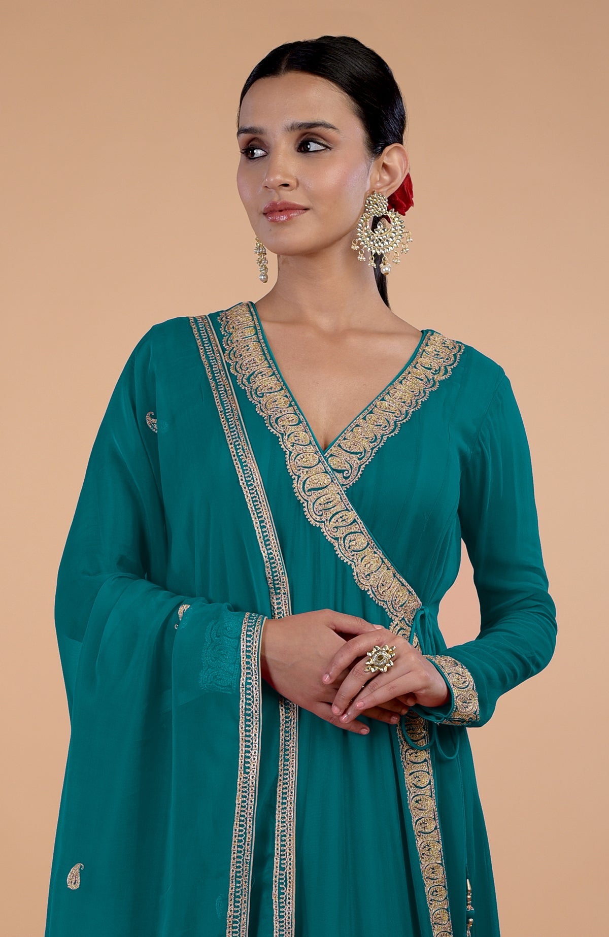 Teal blue angrakha anarkali set with gold Kashmiri Tilla paisley embroidery.