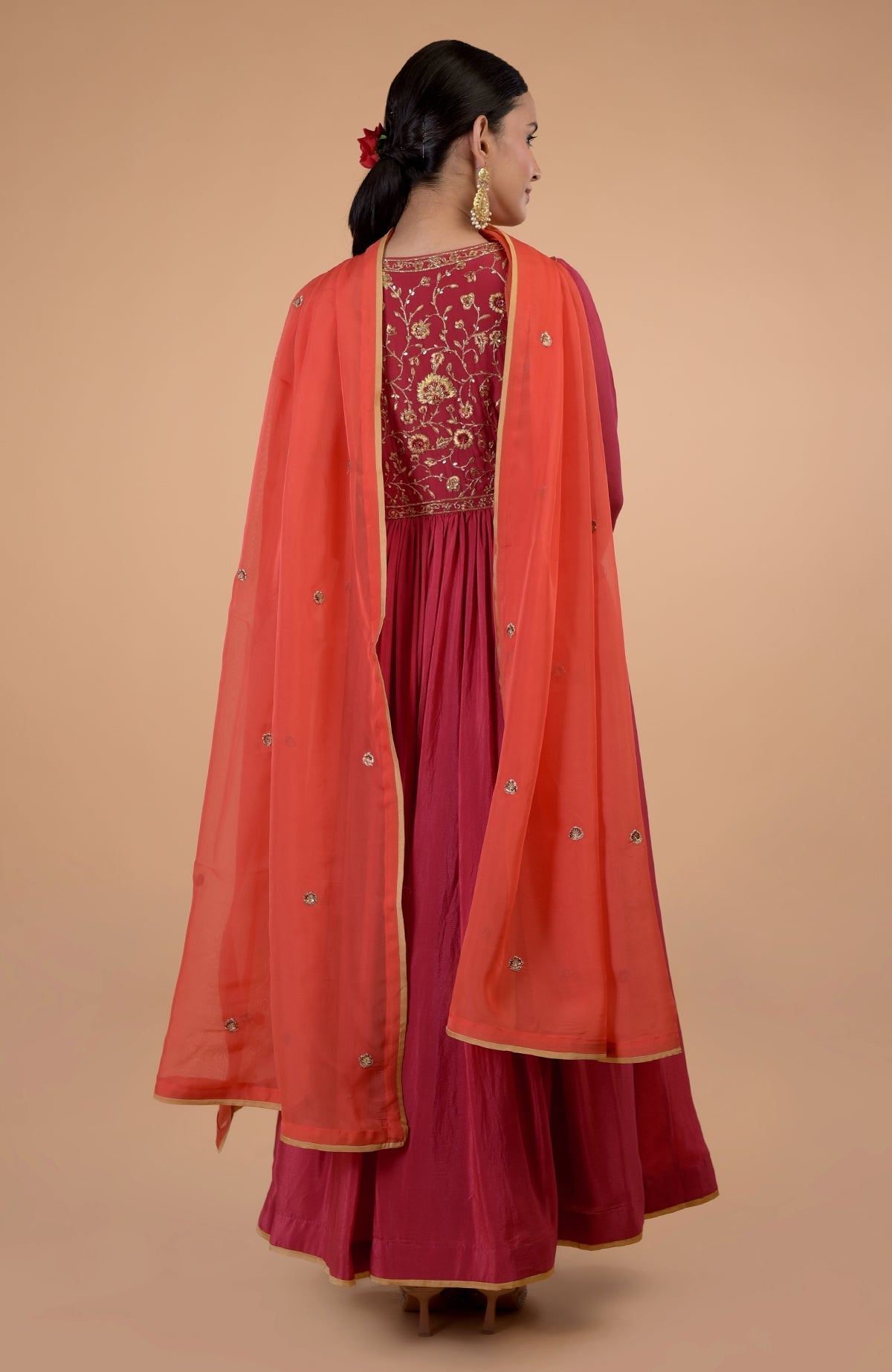 Red-orange zardozi and resham embroidered anarkali set with a matching dupatta.