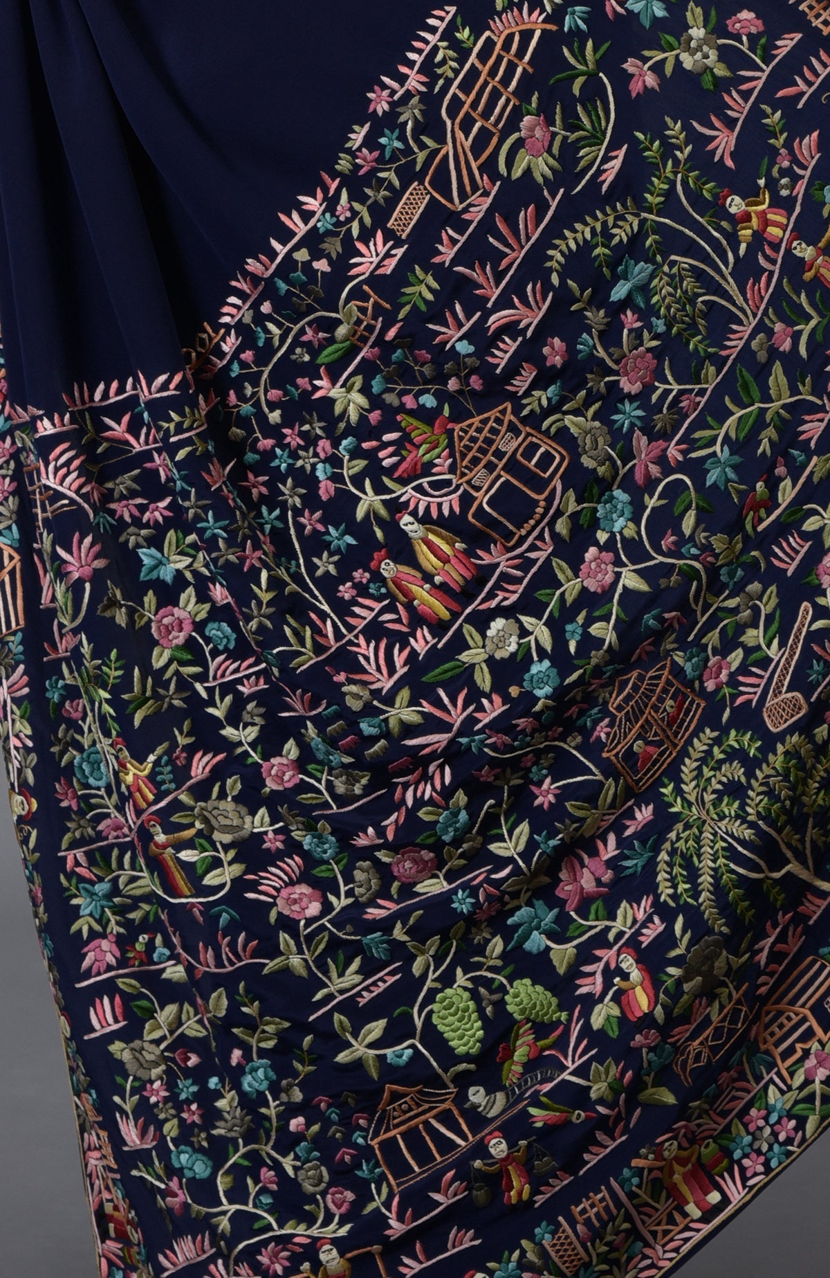 Midnight blue Parsi Gara hand-embroidered saree with colorful Cheena Cheeni design.