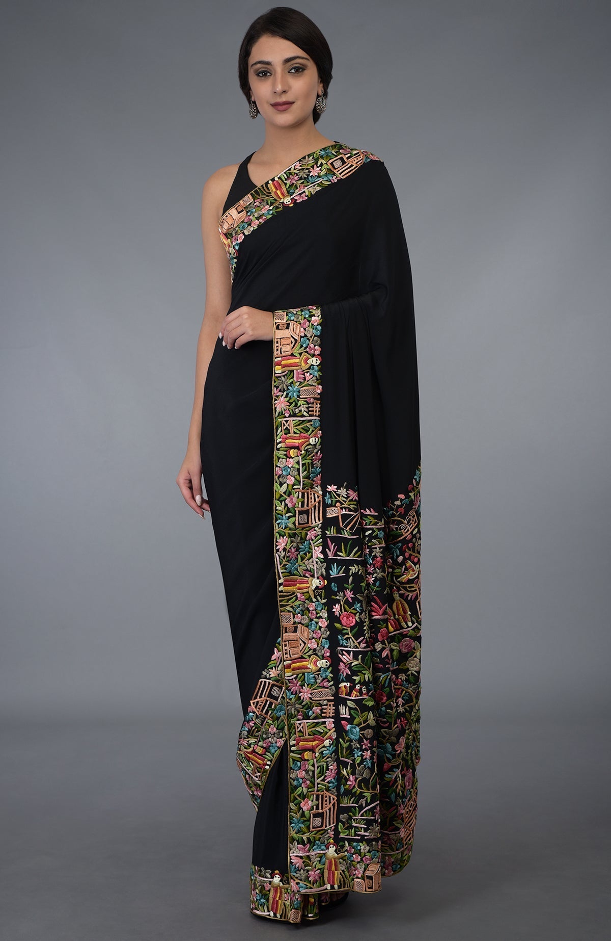 Black Parsi Gara hand embroidered saree with vibrant floral and figural patterns.