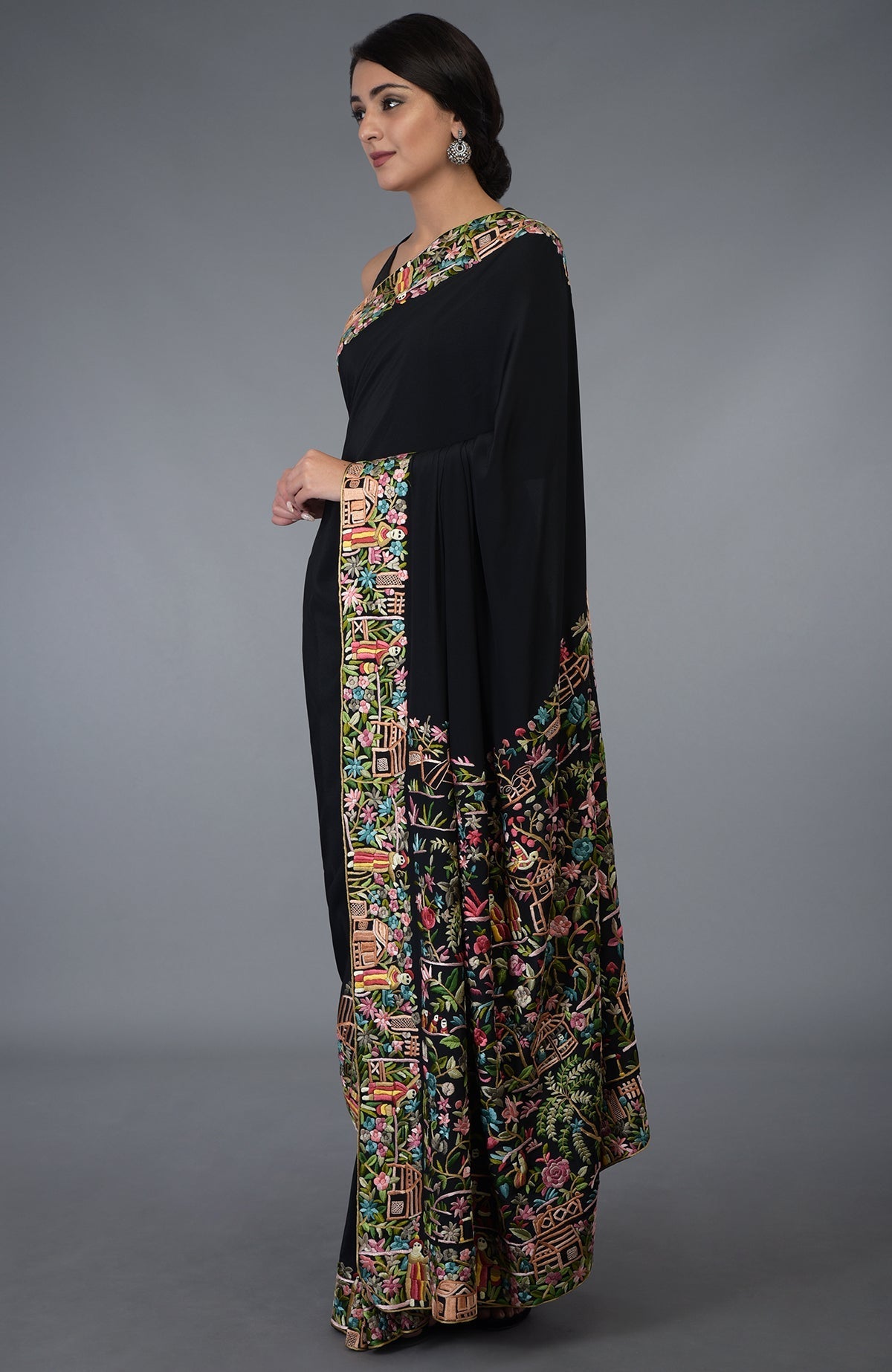 Black Parsi Gara hand embroidered saree with vibrant floral and scenic patterns.