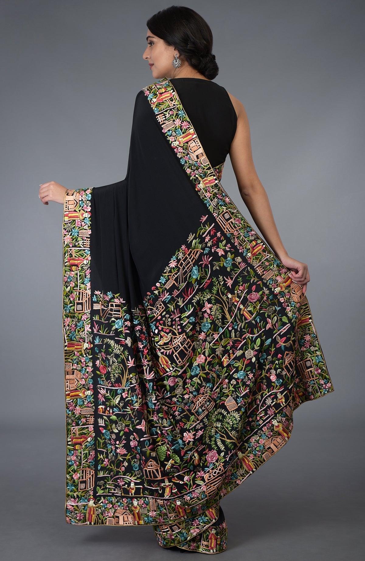 Black Parsi Gara hand embroidered saree with vibrant floral and figural motifs.