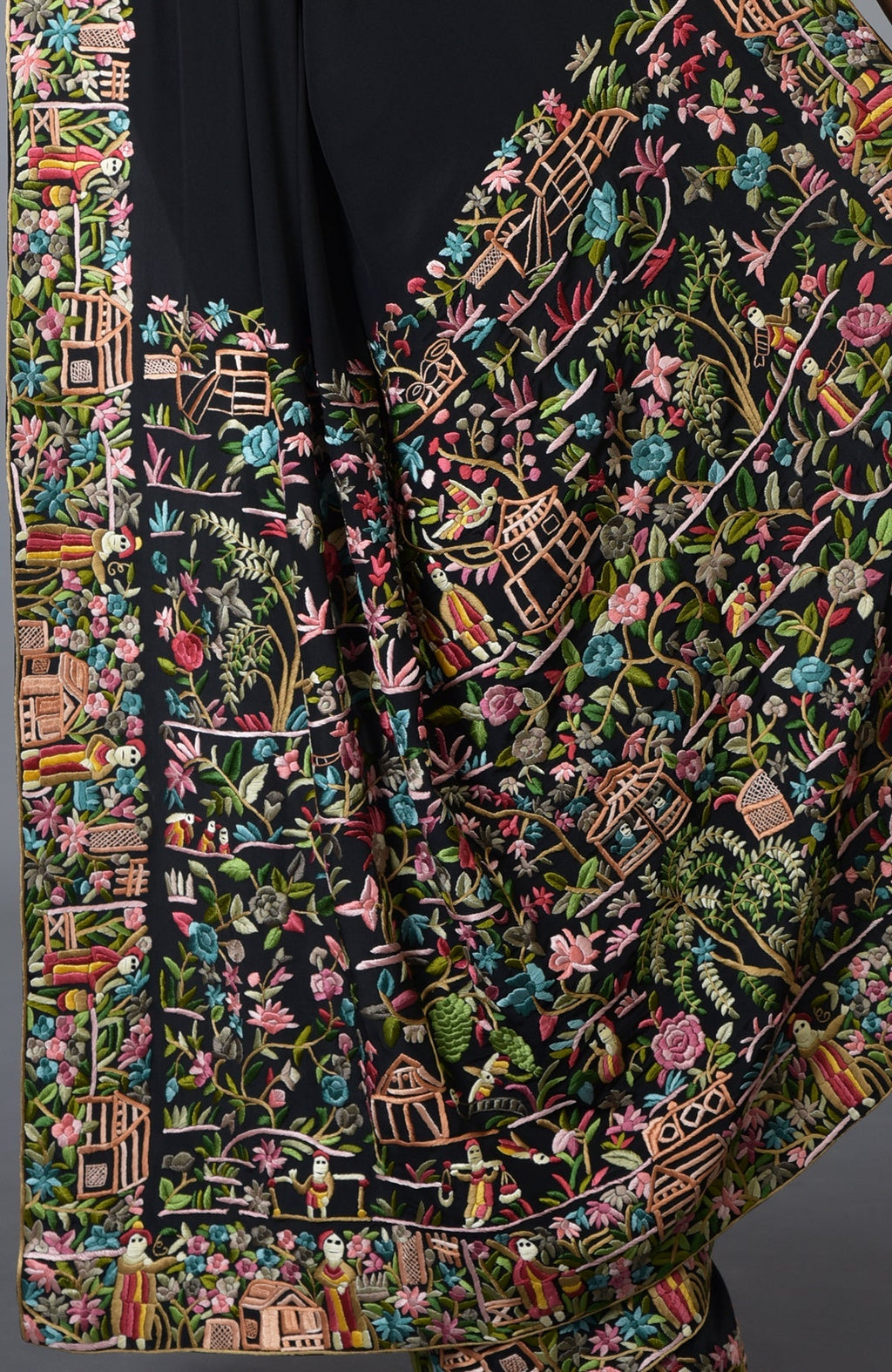 Black Parsi Gara hand-embroidered saree with colorful Chinese landscape and figures.