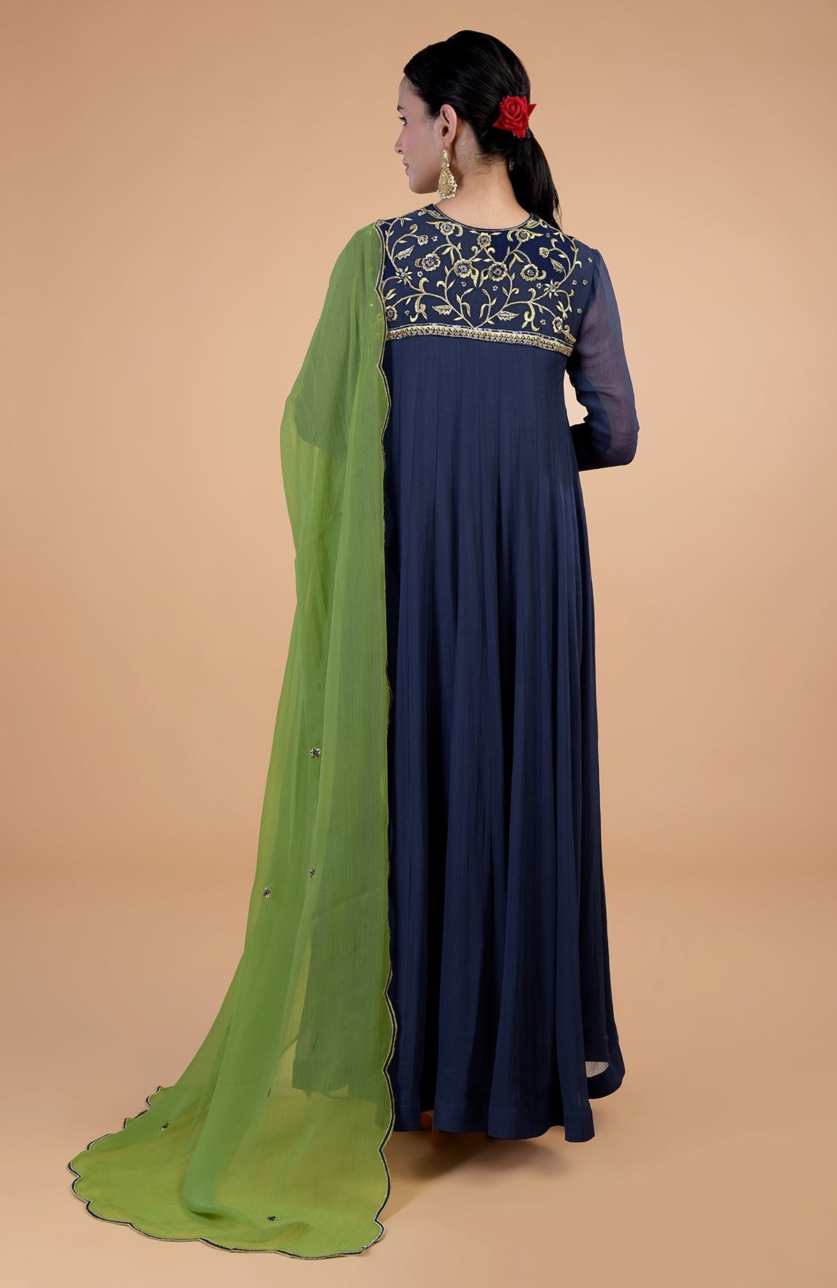 Midnight blue anarkali set with green resham and zardozi embroidery.