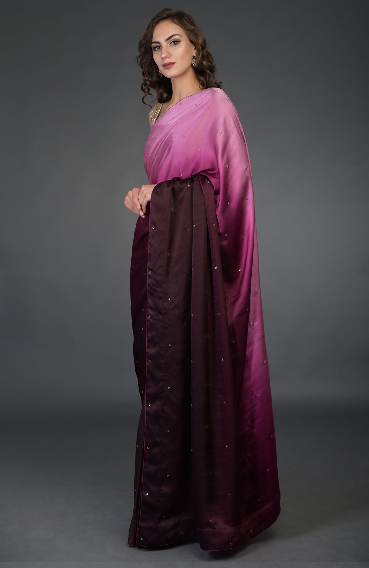 Wine-pink ombre satin silk saree with sequin and zardozi embroidery.