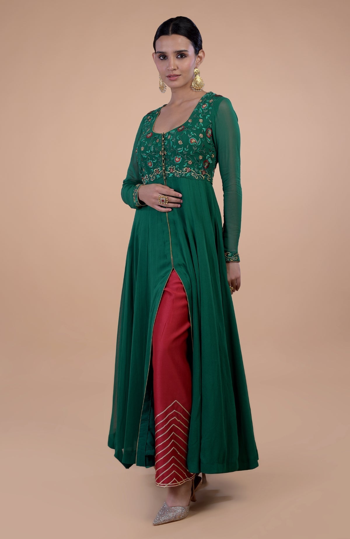 Emerald green and red resham and zardozi embroidered Anarkali set.