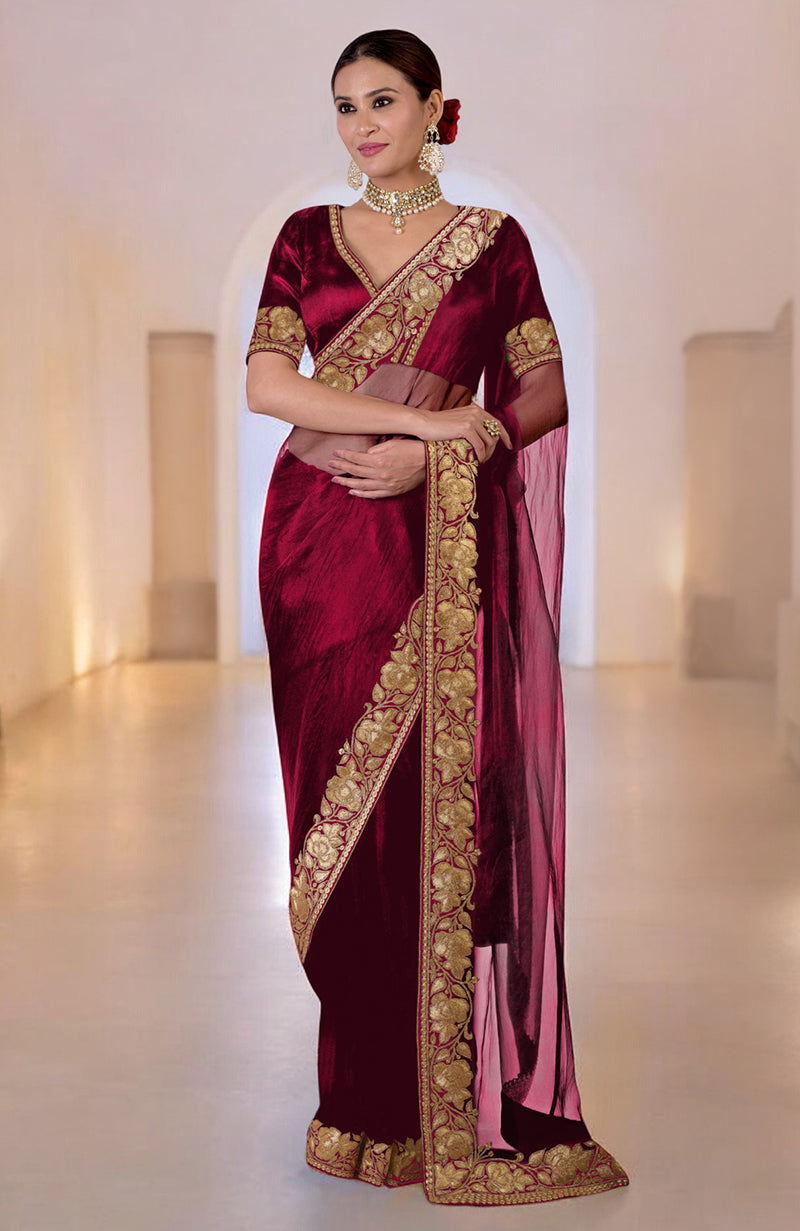 Blood red Kashmiri Tilla embroidered saree with a matching blouse.