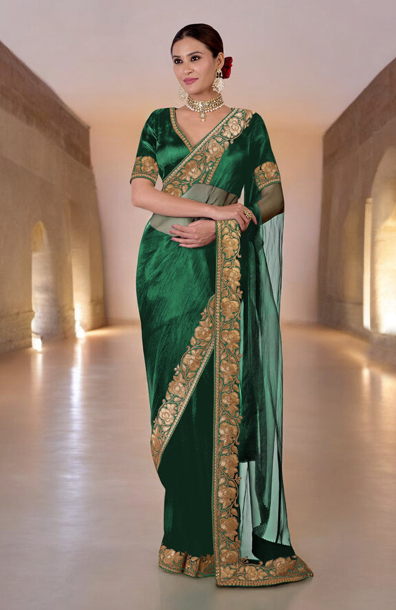 Emerald green Kashmiri Tilla embroidered saree with a matching blouse.