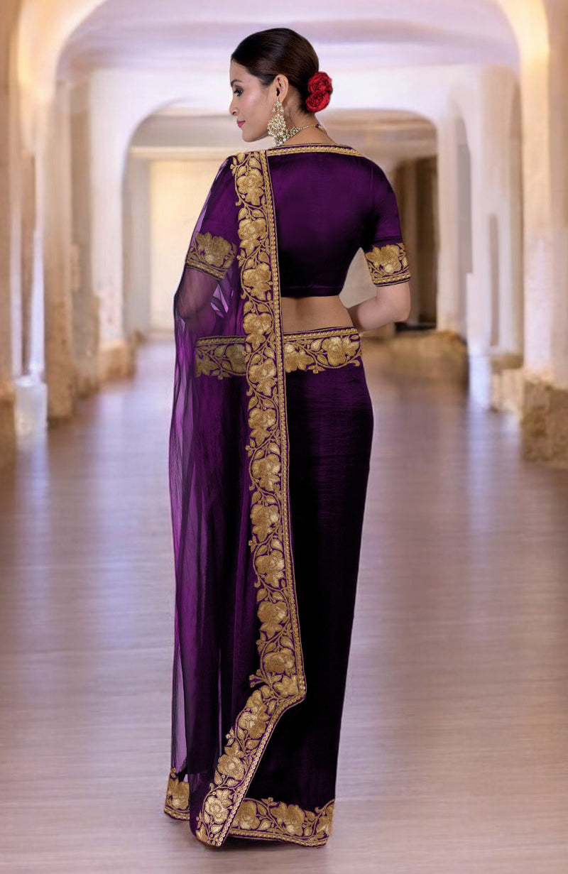 Plum Kashmiri Tilla embroidered saree with a matching blouse.