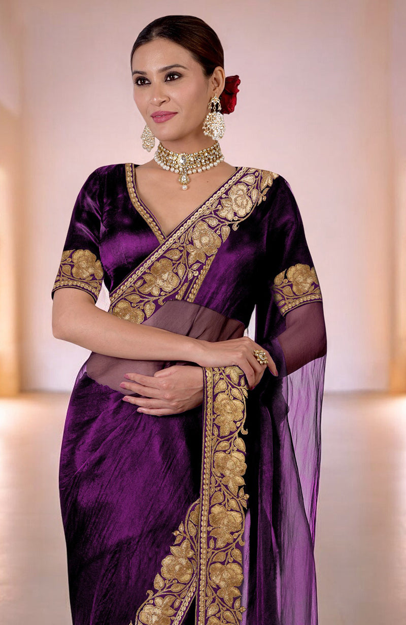 Plum silk organza saree with gold Kashmiri Tilla embroidery and a matching blouse.