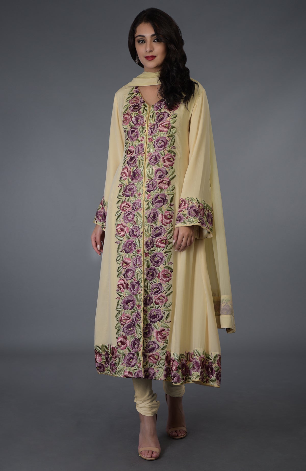 Lemon chiffon Parsi Gara embroidered suit with floral patterns.