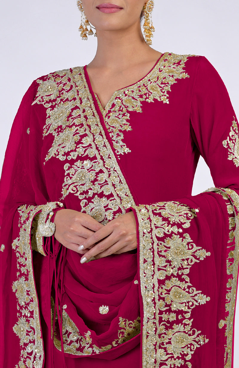 Bright rose gold kurta set with intricate Kashmiri tilla and zardozi hand embroidery.