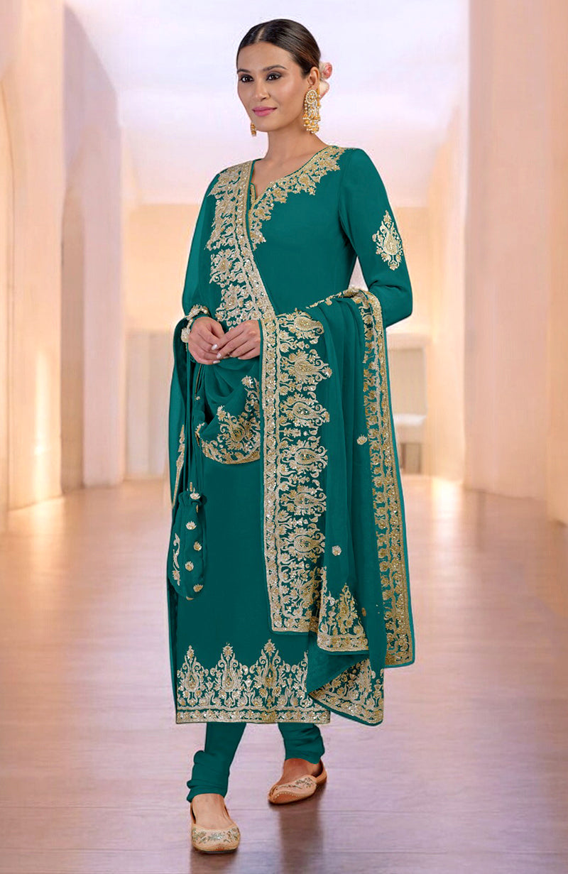 A woman models a teal kurta set with gold embroidery and a matching potli bag.