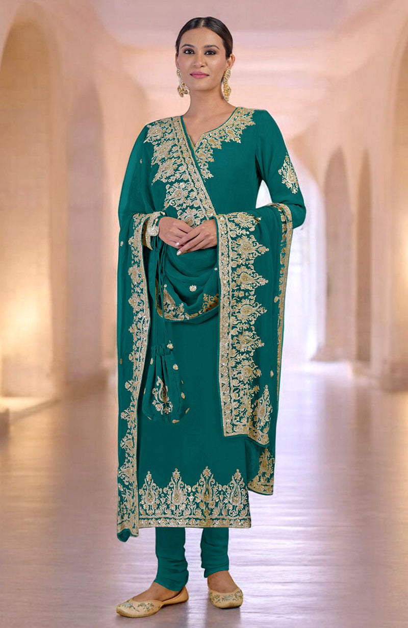 A woman models a teal kurta set with gold embroidery and a matching potli bag.