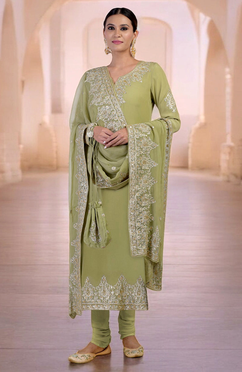 Bog green kurta set with gold Kashmiri tilla and zardozi hand embroidery.