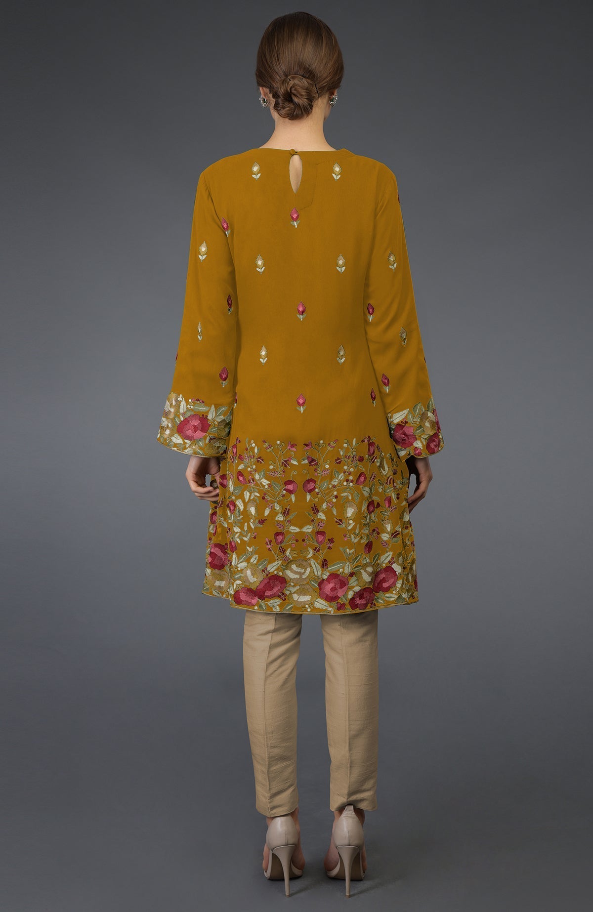 Dijon mustard Parsi Gara embroidered tunic kurta with bell sleeves and beige pants.