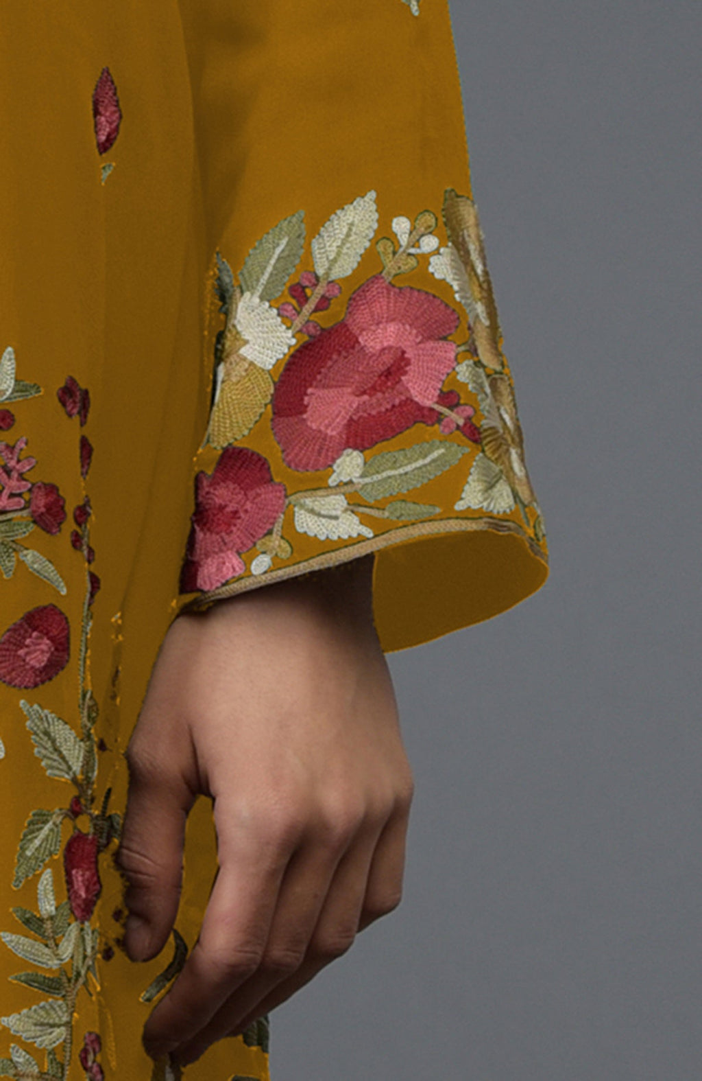 Dijon mustard tunic kurta with Parsi Gara floral embroidery on the sleeve and side.