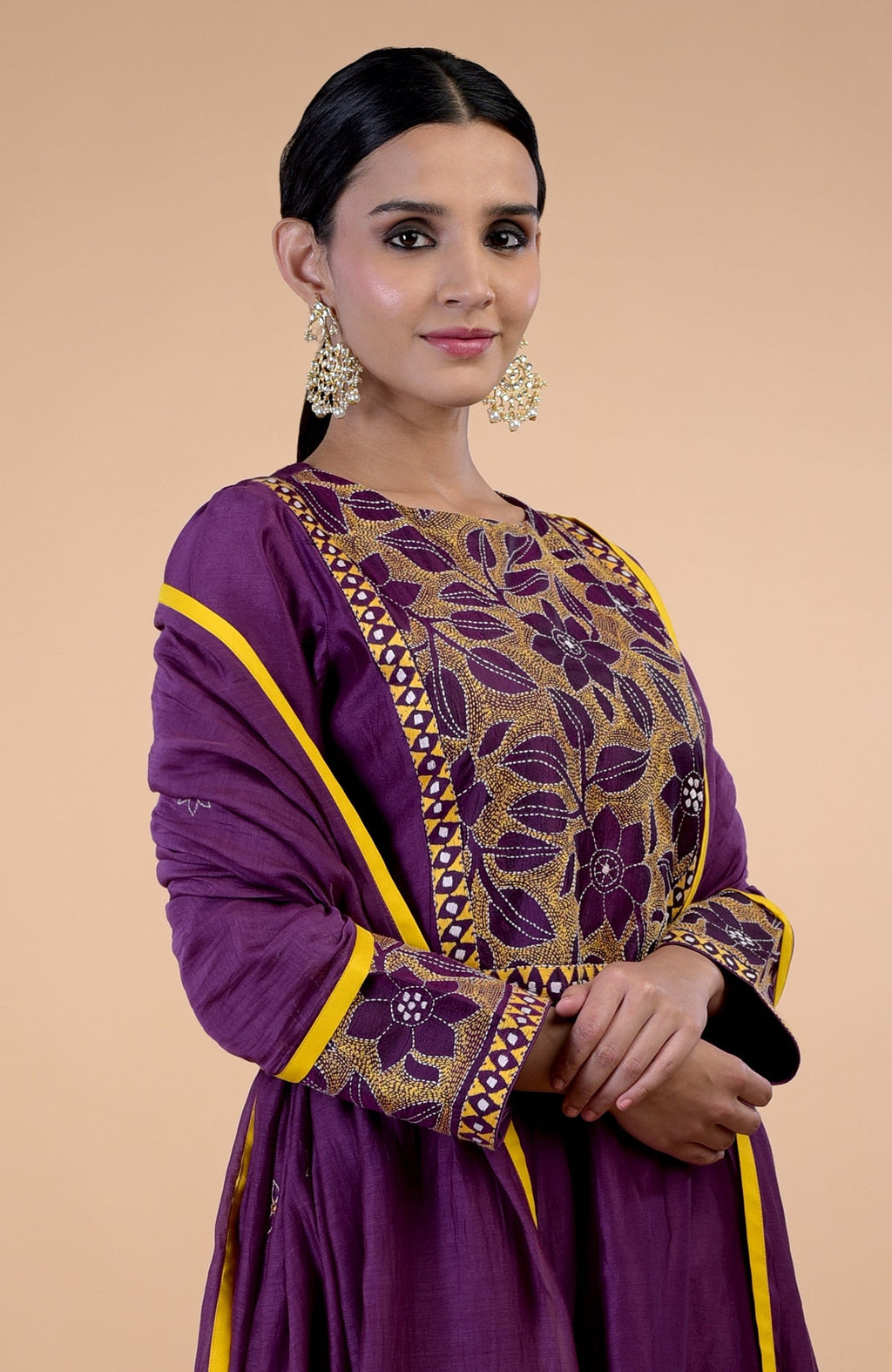 Plum Kantha hand-embroidered kalidaar kurta set with yellow piping.