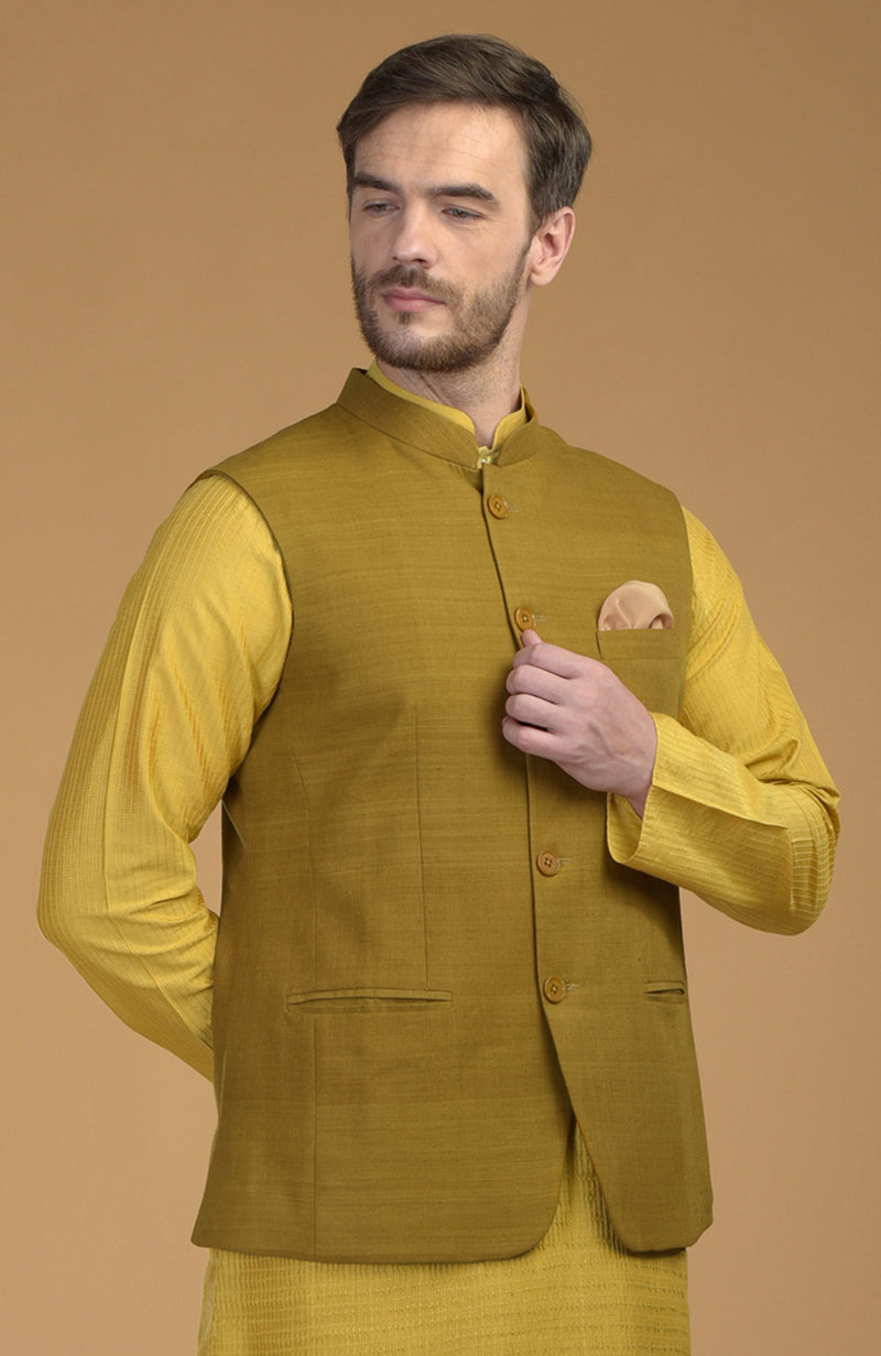 Ivory Anarkali with Mango Mojito dupatta and Sunglow pintuck kurta with mustard waistcoat jacket set