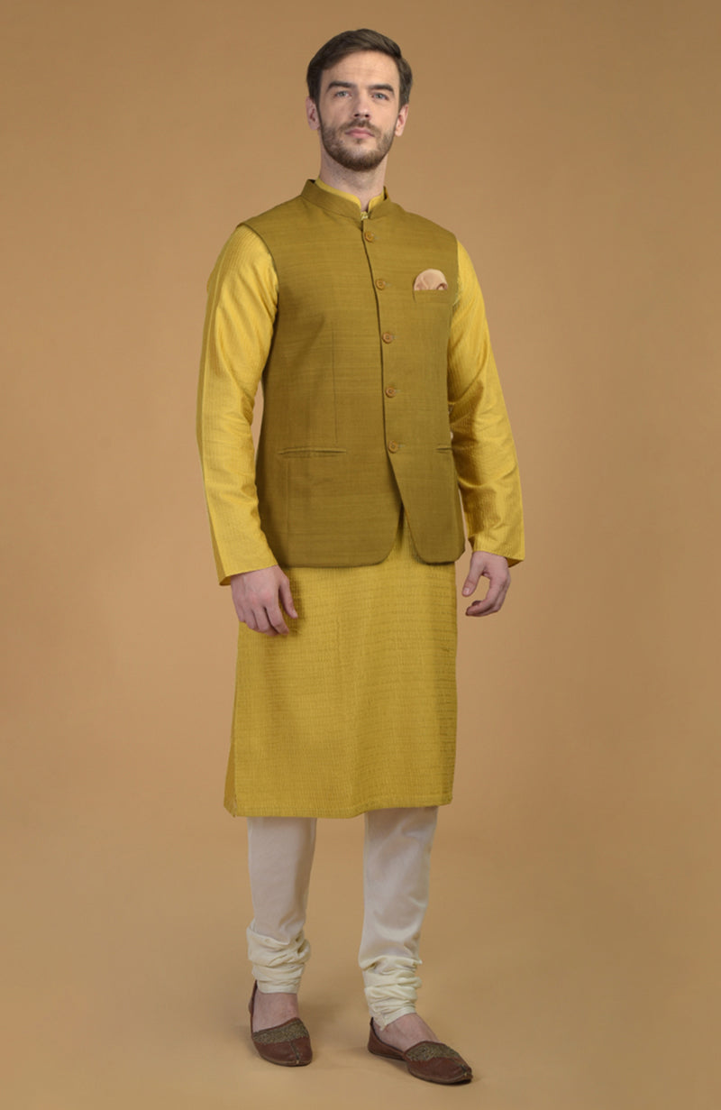 Ivory Anarkali with Mango Mojito chiffon dupatta and Sunglow pintuck kurta with mustard waistcoat set
