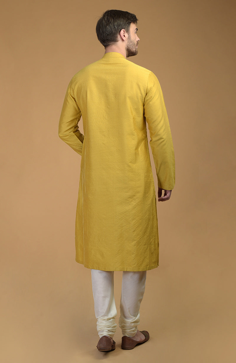 Ivory Anarkali with Mango Mojito dupatta and Sunglow yellow pintuck kurta with mustard waistcoat set