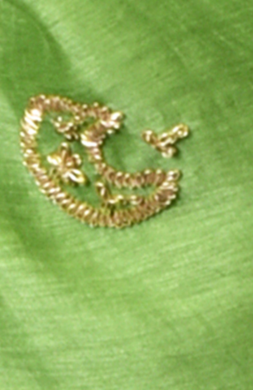 Pepper stem linen saree with rose gold zardozi hand embroidery.