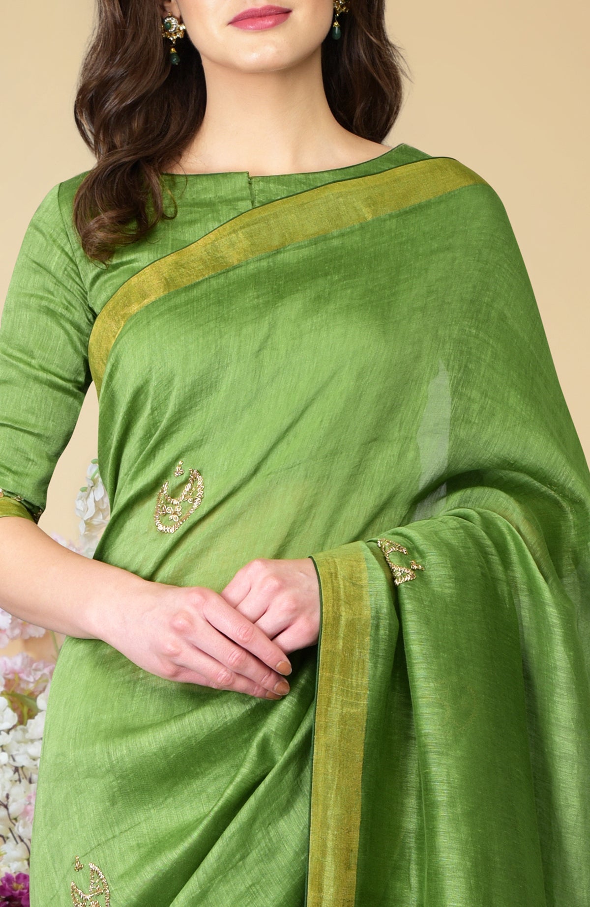 Pepper Stem Zardozi Hand Embroidered Linen Saree with gold embroidery and zari borders.