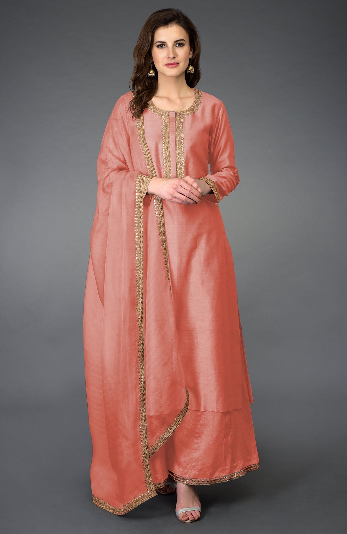 Terracotta Marori and Sequin Work Farshi Palazzo Suit with a matching dupatta.