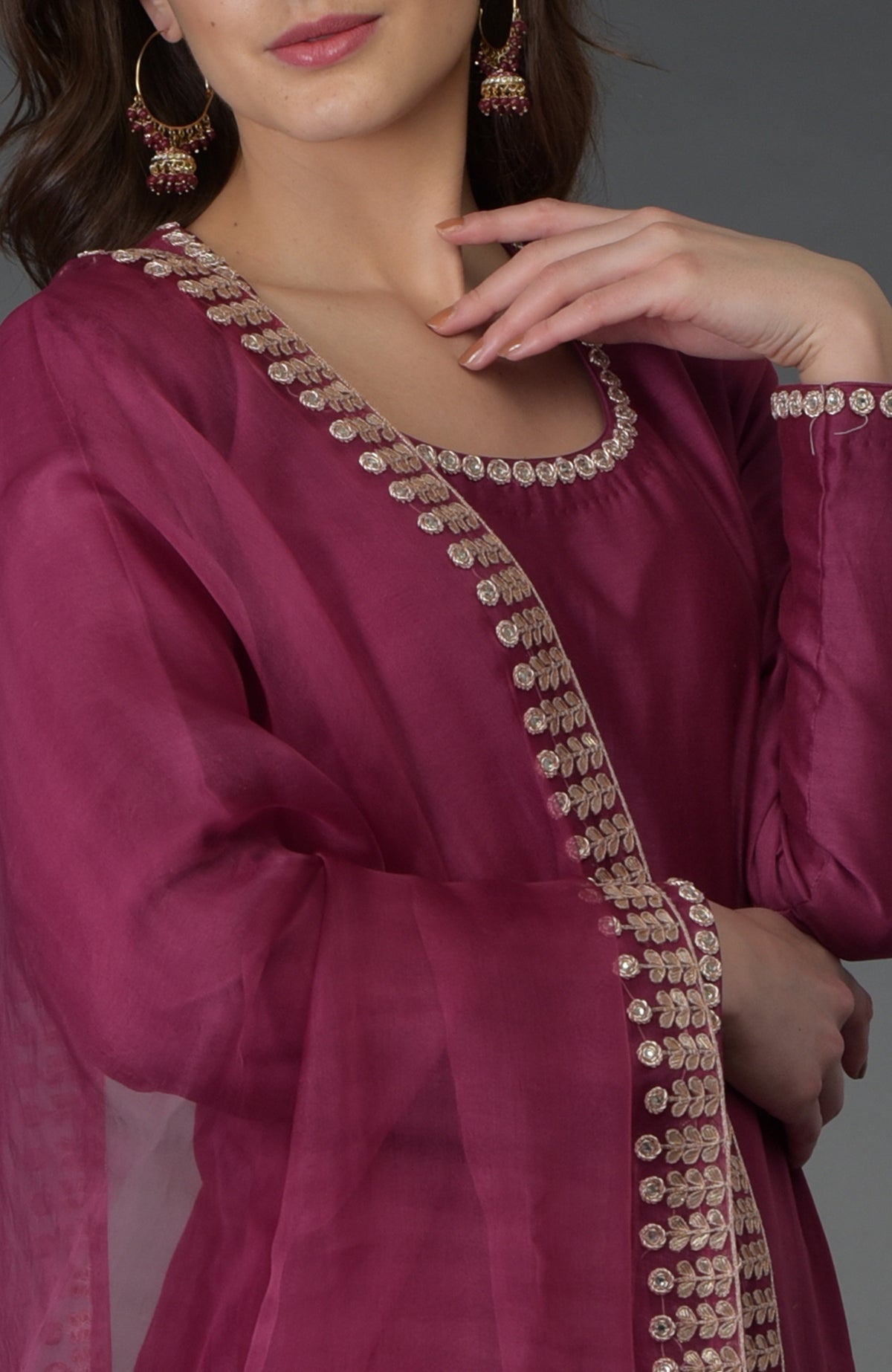 Burgundy Zardozi Gota Patti & Crystal Work Farshi Suit with embroidered borders.