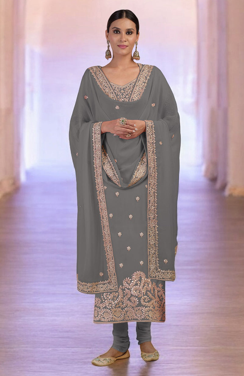 Grey kurta set with intricate rose gold embroidery and a matching dupatta.