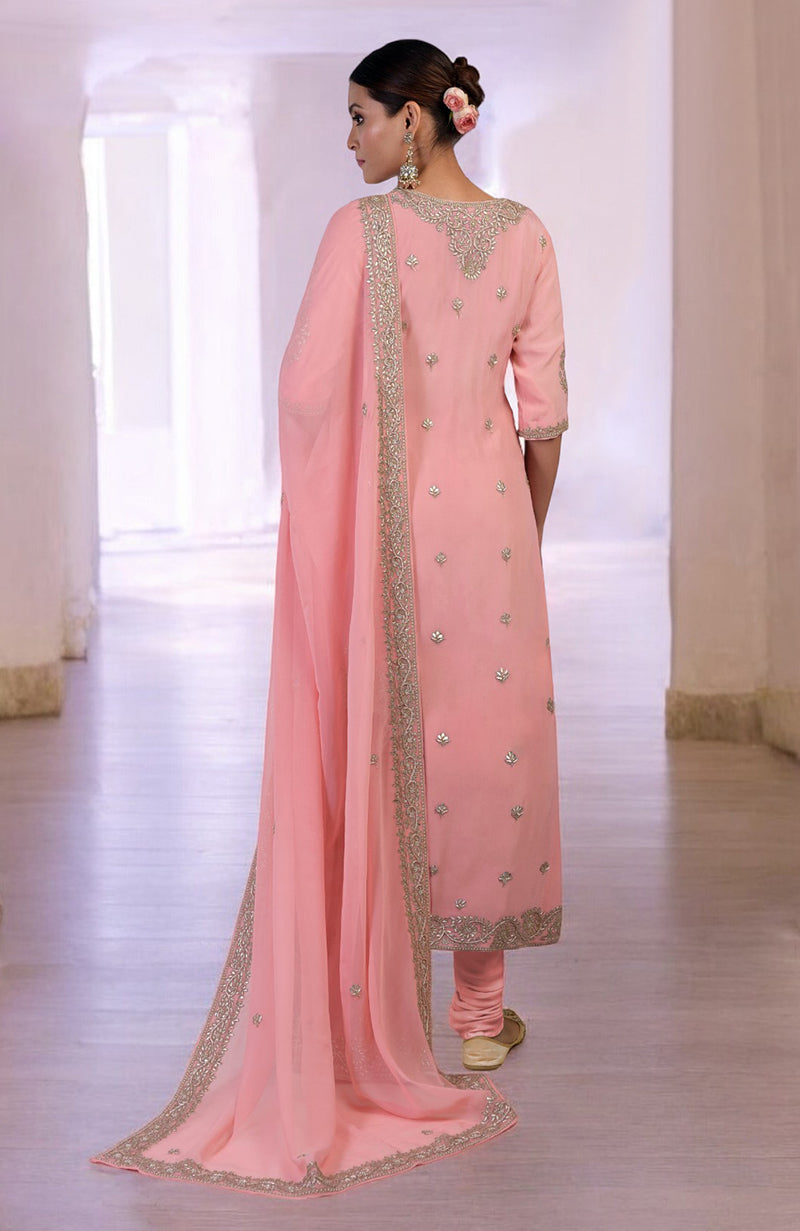Pink kurta set with rose gold gota patti, zardozi embroidery, sequins, and matching churidar and dupatta.