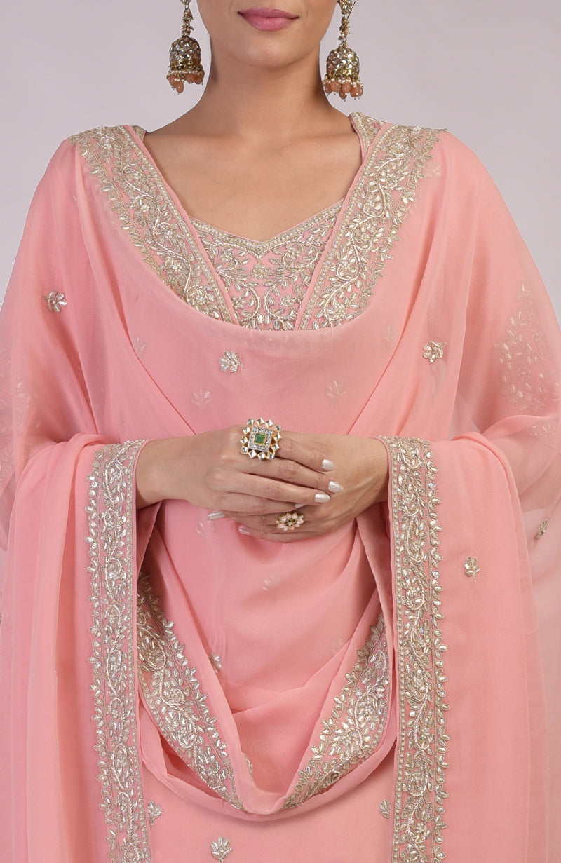Pink kurta set with rose gold marori gota patti and zardozi embroidery, paired with churidar and dupatta.